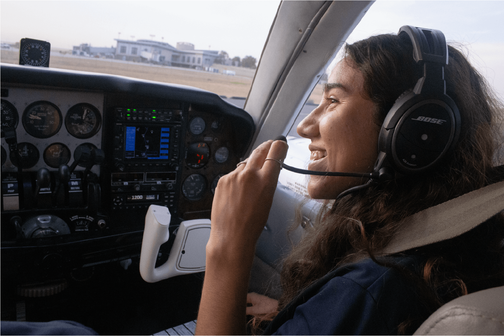 CAU Accelerated Programs - female student in cockpit