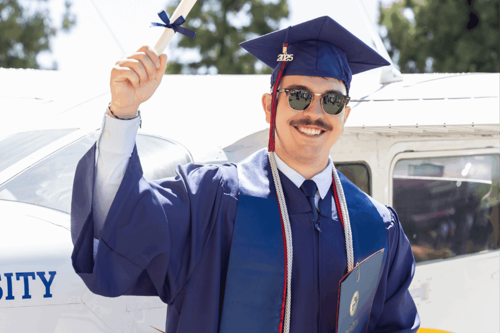 cau-grad-with-diploma